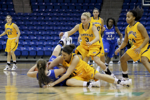<h3> Quinnipiac 58, CCSU 49</h3> Bobcats and Blue Devils battle for a loose ball.