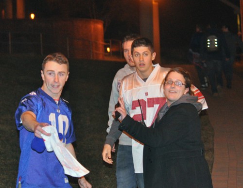 Students riot following Super Bowl XLVIA residential assistant talks to students on campus after Super Bowl XLVI