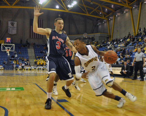 St. Francis (N.Y.) 64, Quinnipiac 56Quinnipiac guard Dave Johnson drives down the baseline past St. Francis (N.Y.)'s Ben Mockford in the second half of Thursday's game.