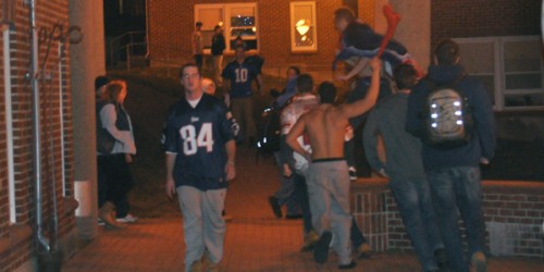 Students celebrate on campus following Super Bowl