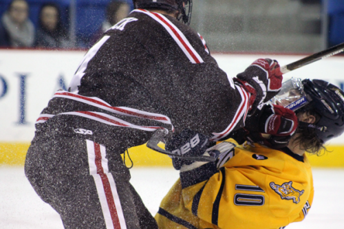 Quinnipiac beats Brown, 4-2Quinnipiac's Connor Jones gets checked by Brown's Kyle Quick in the first period.