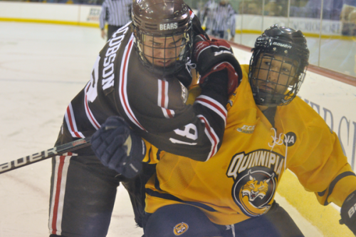Brown 4, Quinnipiac 1Quinnipiac's Loren Barron and Brown's Ryan Jacobsen battle for the puck in the first period of Friday's game.
