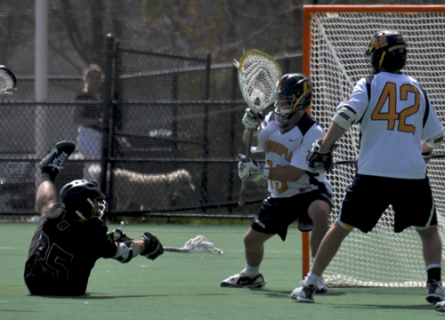 Bryant 9, Quinnipiac 5Quinnipiac's Dylan Torey tries to make a save in the third quarter of Saturday's game vs. Bryant.