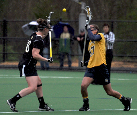 Bryant 8, Quinnipiac 6Quinnipiacs Phoebe Laplante tries to gain possession of the ball from a draw control in the second half of Sundays game vs. Bryant.