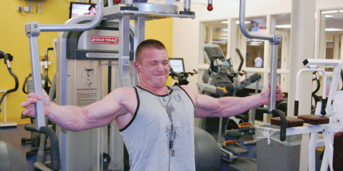 Tyler Smith pushes 245 pounds using his pectoral muscles. His workouts are only half the battle to achieving his goal of becoming a professional bodybuilder. The other half lies in his diet.