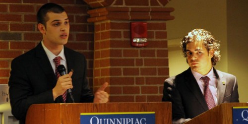 Theo Siggelakis (left) debates Evan Milas in front of students who came to the Student Government Association debate for its annual elections.