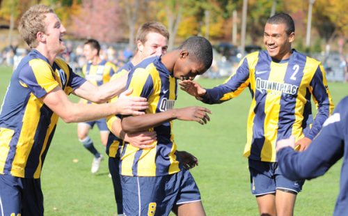 <h3>Quinnipiac 3, Mount St. Mary's 0</h3>Quinnipiac's Machel Baker celebrates with his teammates after scoring a goal in Sunday's game vs. Mount St. Mary's.