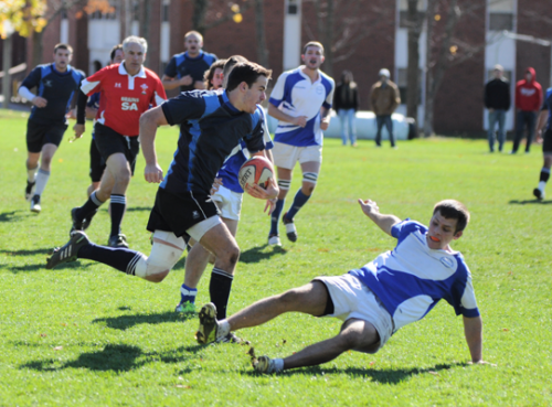 New Blue 43, CCSU 19New Blue's Marc Villalongue evades a defender to score a try in Saturday's game vs. CCSU.