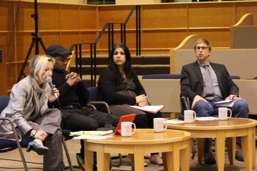 From left to right: University Honors Program Director Kathy Cooke, sociology professor Don Sawyer, legal studies professor Sujata Gadkar-Wilcox and sociology professor Keith Kerr lead the discussion with students. 