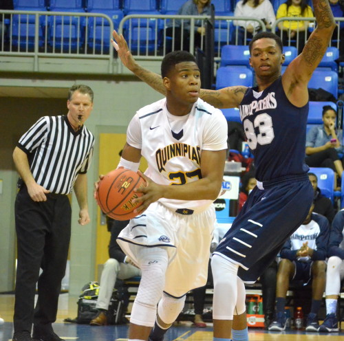 Mens basketball hangs on to defeat Saint Peters