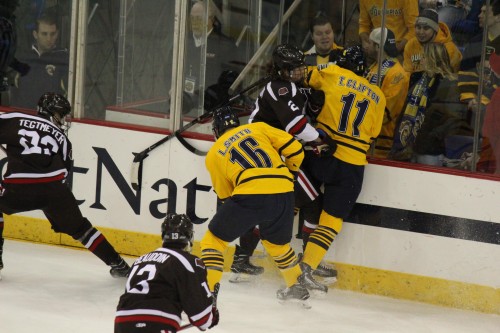 Men’s ice hockey team routs Brown in first game of playoffs