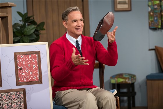 A Beautiful Day in the Neighborhood opened up with Tom Hanks singing the theme song of the beloved series, Mister Rogers Neighborhood.