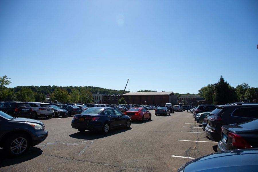 Students wait in long lines to find available parking spots in the North Lot.