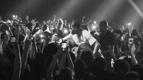 Rapper Travis Scott engages with his fans during a 2017 concert. (Photo by Enjoy The Show/Flickr)