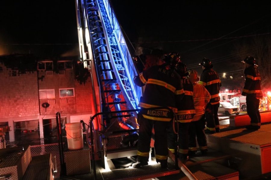 Hamden firefighters battle the blaze at the Feb. 14, Warner St. apartment fire.
