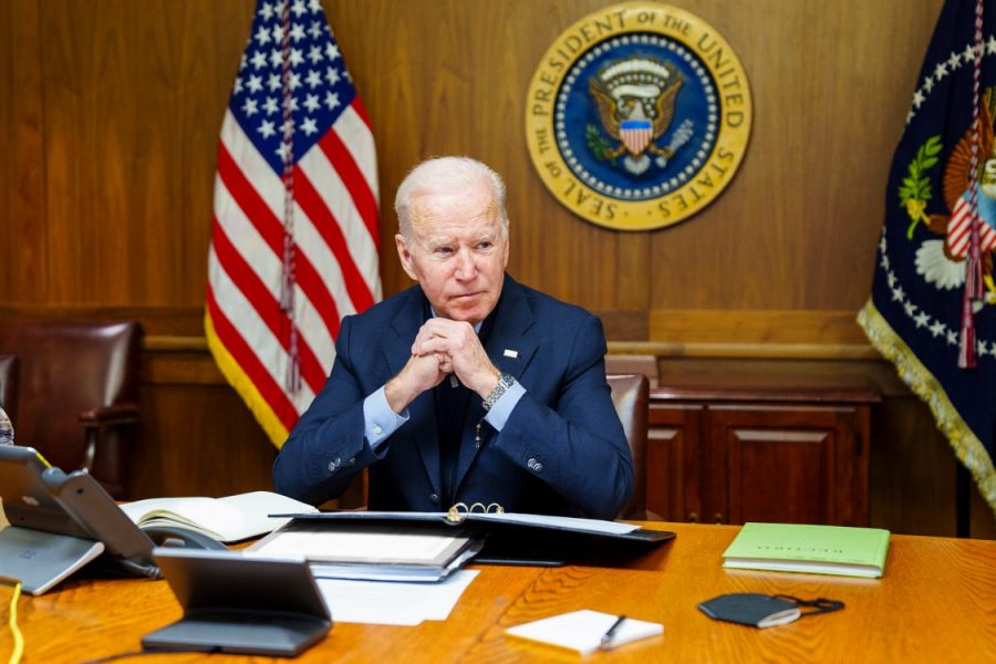 President Joe Biden sat at his desk at Camp David on Feb. 12. He spoke to Russian President Vladimir Putin that day, warning him that the U.S. would enforce severe consequences if Russia invades Ukraine. (Photo by The White House)