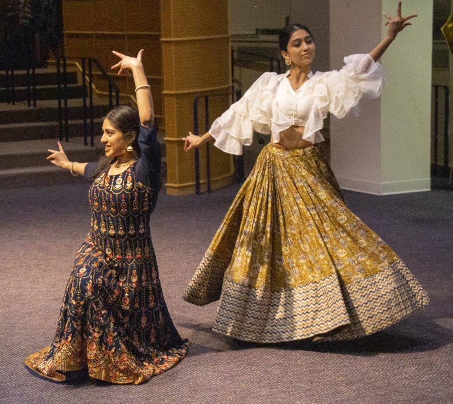 Seniors Pratibha Thippa (left) and Ashna Patel (right) perform a choreographed dance routine for the audience.