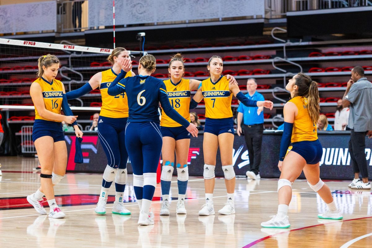 The Quinnipiac volleyball team reacts after falling to Fairfield in the 2023 MAAC Championship on Nov. 19, 2023.