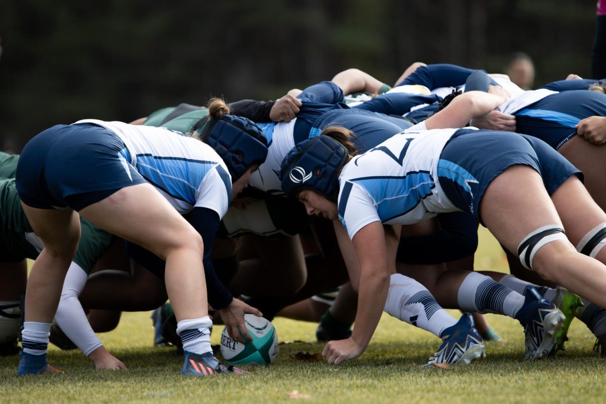 Quinnipiac rugby gets into a scrum during a 38-8 loss to Dartmouth in the NIRA semifinals. 