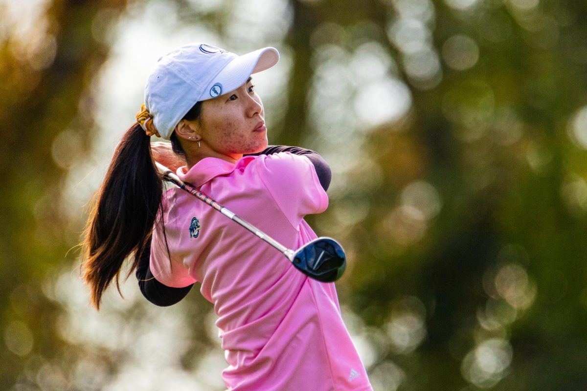 Senior Aimee Uchida hits a drive at The Farms Country Club in Wallingford during the Quinnipiac Classic on Oct. 9, 2023. 