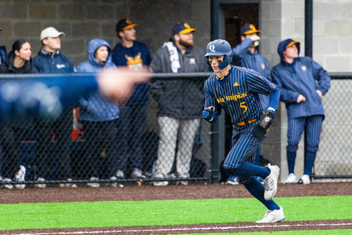 Senior outfielder Jared Zimbardo rounds third and heads home in a game against Merrimack on March 2.