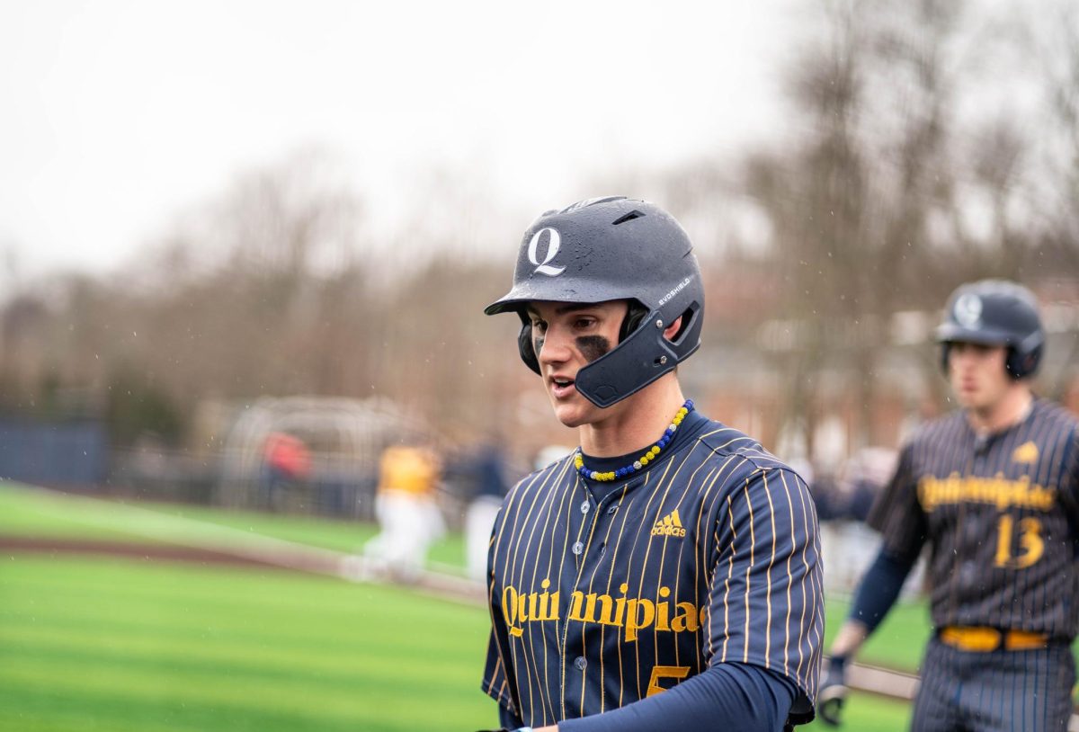 Senior centerfielder Jared Zimbardo walks off the field in a game against Merrimack on March 2.