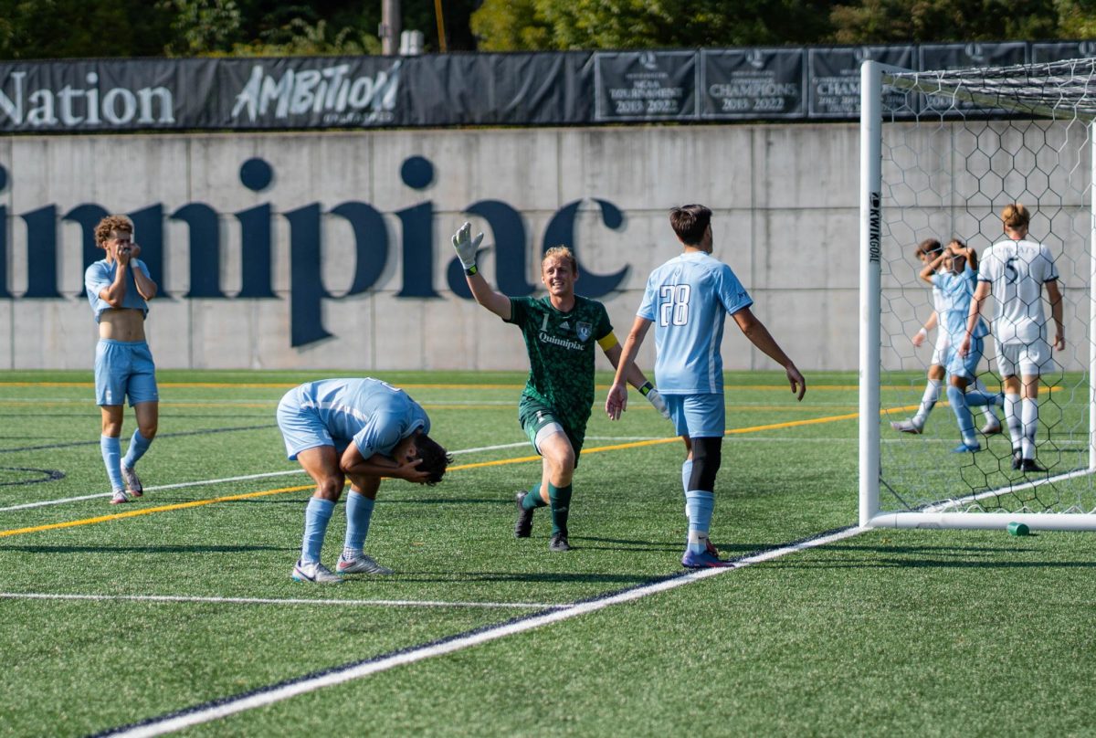 Junior goalkeeper Karl Netzell celebrates after Columbia misses shot  on 8/30.