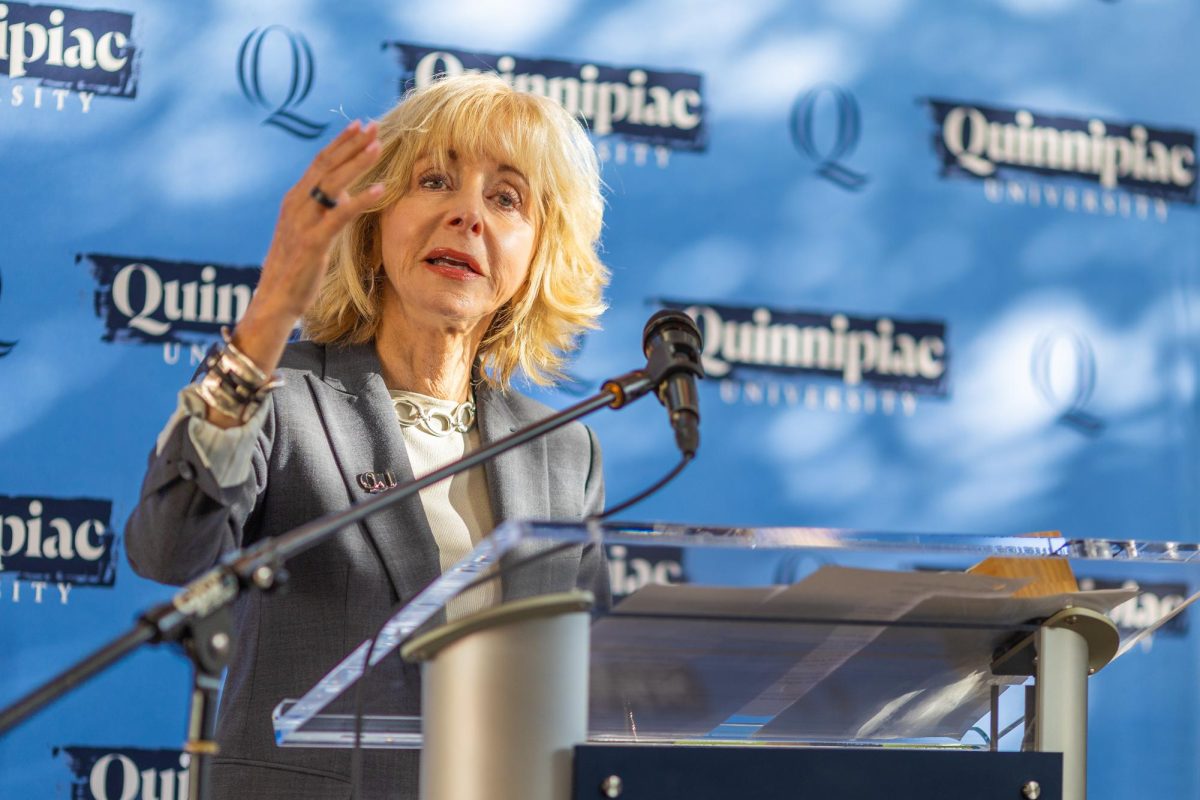 Quinnipiac University President Judy Olian speaks to observers prior to being presented with a Sustainability Achievement on Monday Nov. 13, 2023 at Quinnipiac's North Haven Campus. 