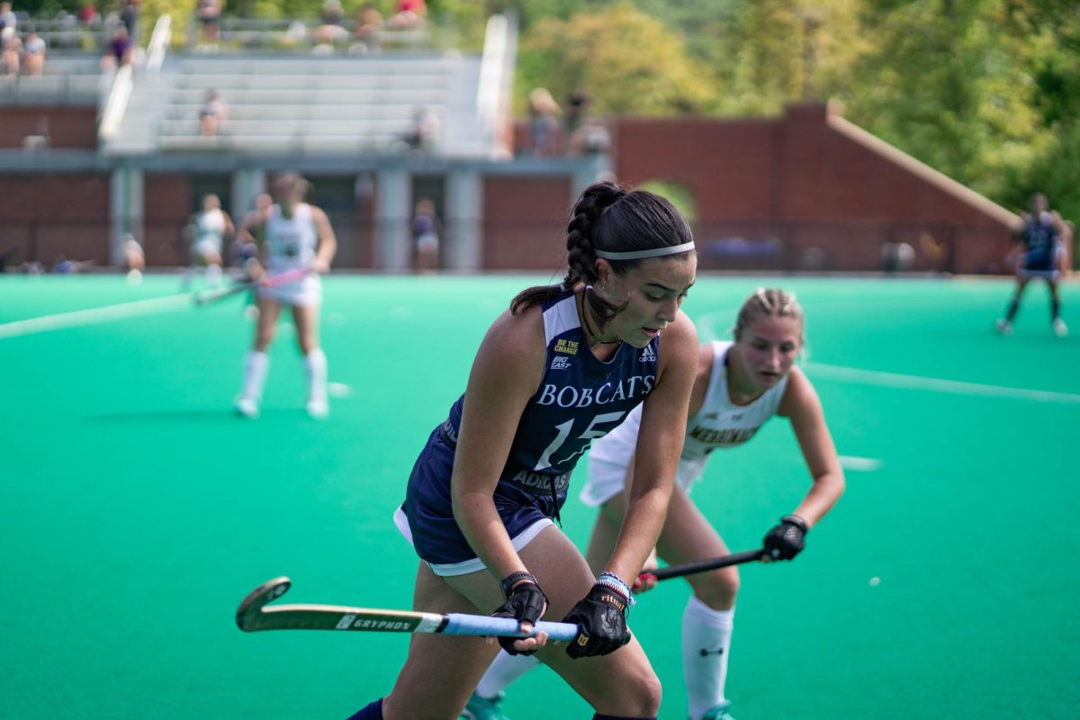 Freshman defender Francisca Eschoyez fights for the ball against a Merrimack player.