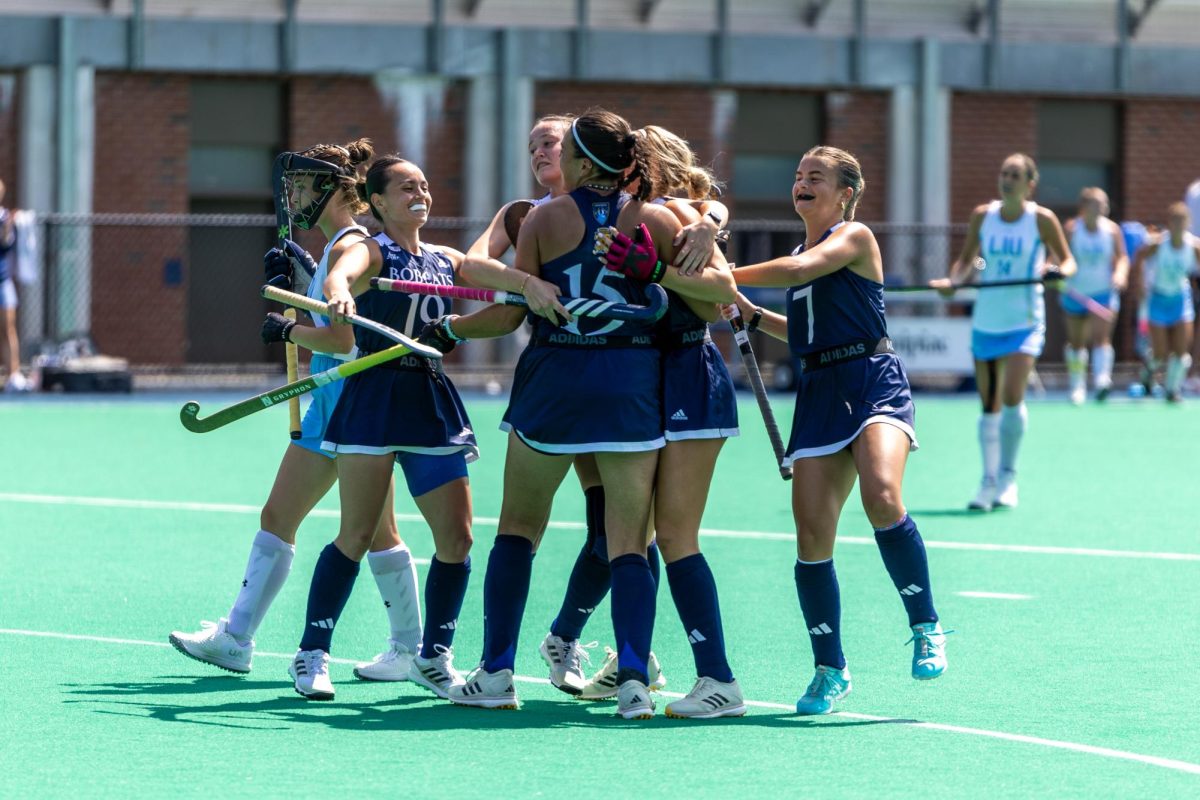 Quinnipiac field hockey celebrates after scoring in a game against LIU on Aug. 30.