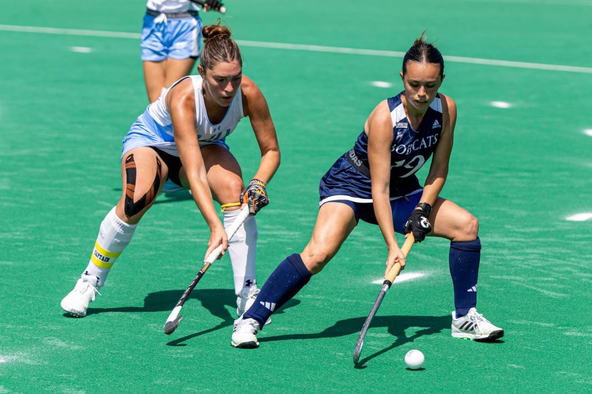 Freshman defenseman Martina Calveira shields the ball away from an oncoming opponent against LIU on Aug. 30.