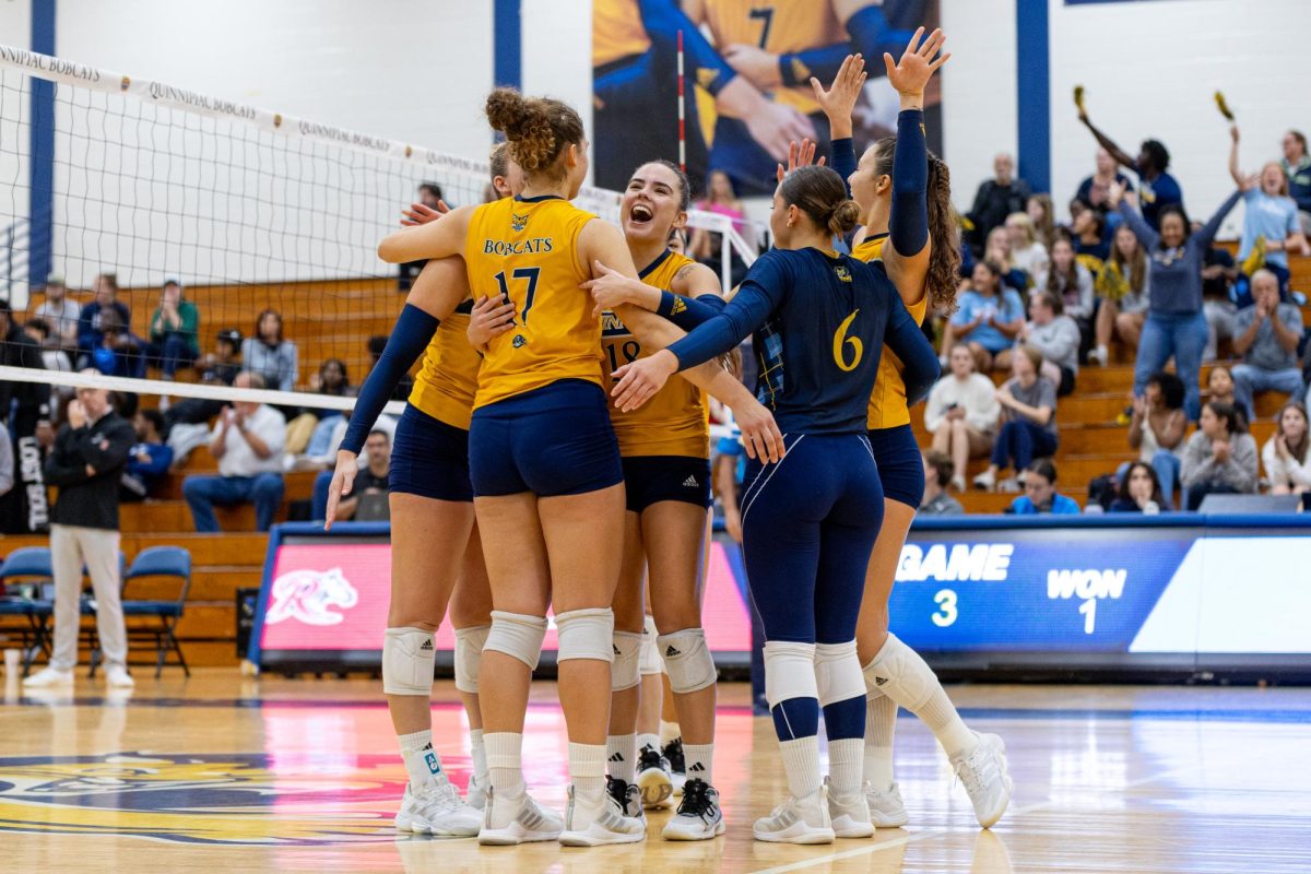 Quinnipiac celebrates in its home opener against Rider on Saturday afternoon.