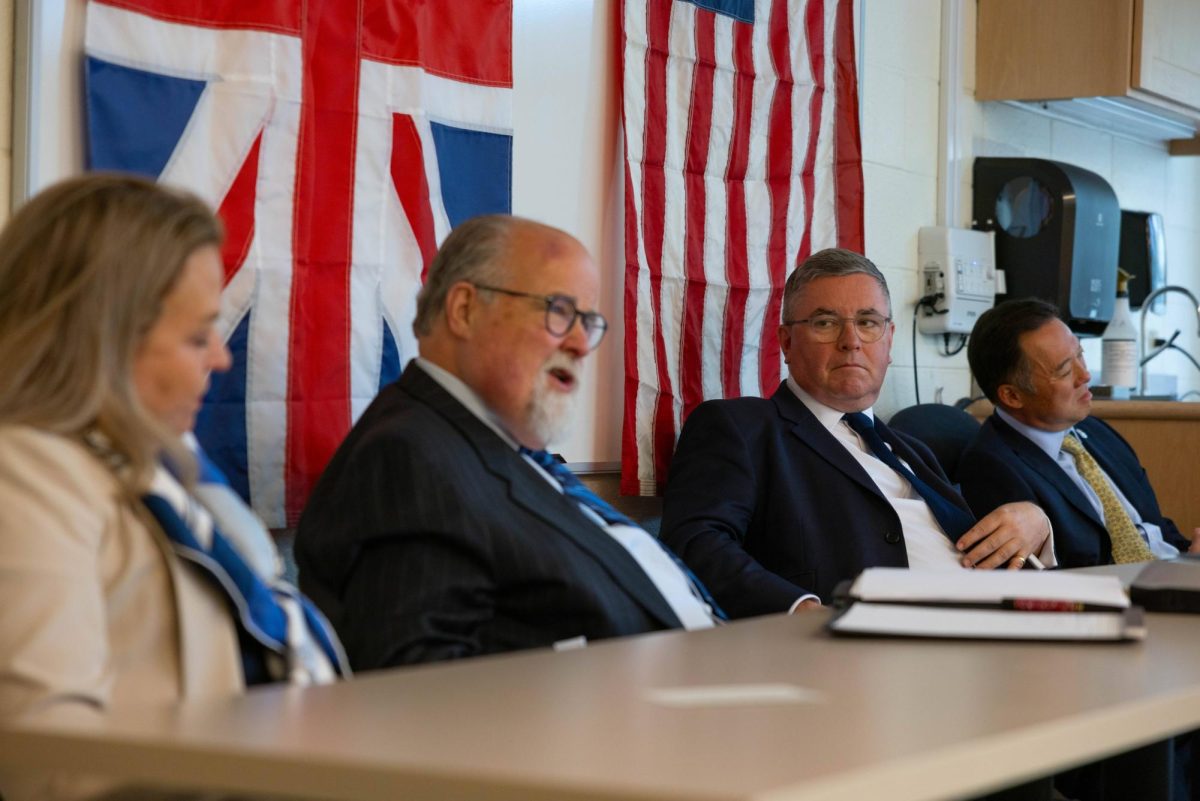 Lucy Dathan (left), state representative, John Ashford (center left), political analyst, Sir Robert Buckland (center right), former Lord Chancellor of Britain and William Tong (right), Connecticut’s attorney general, speak on the upcoming U.S. presidential election.
