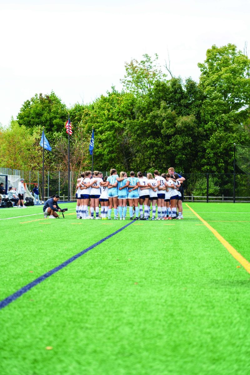 Women’s soccer huddles before a 1-0 win against Siena on Sept. 21.