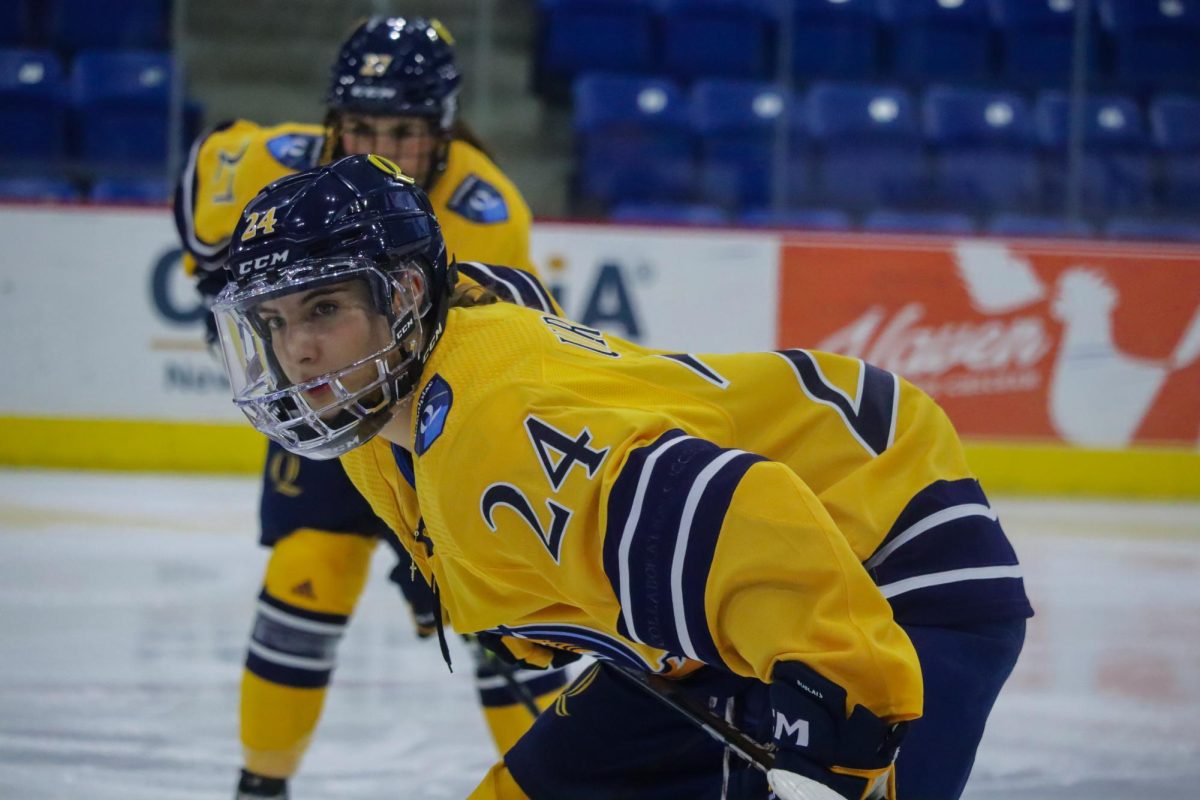 Graduate student forward Sophie Urban lines up for a face-off against Princeton on Feb. 3.