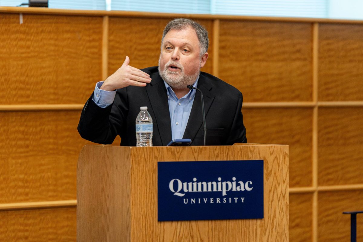 Tim Wise, author of “White Like Me,” talks during the Critical Conversations event.
