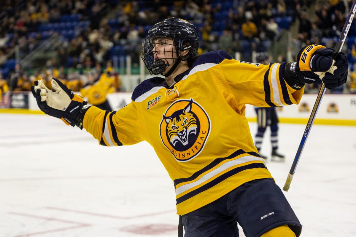 Freshman forward Tyler Borgula celebrates after scoring against UNH on Oct. 25.