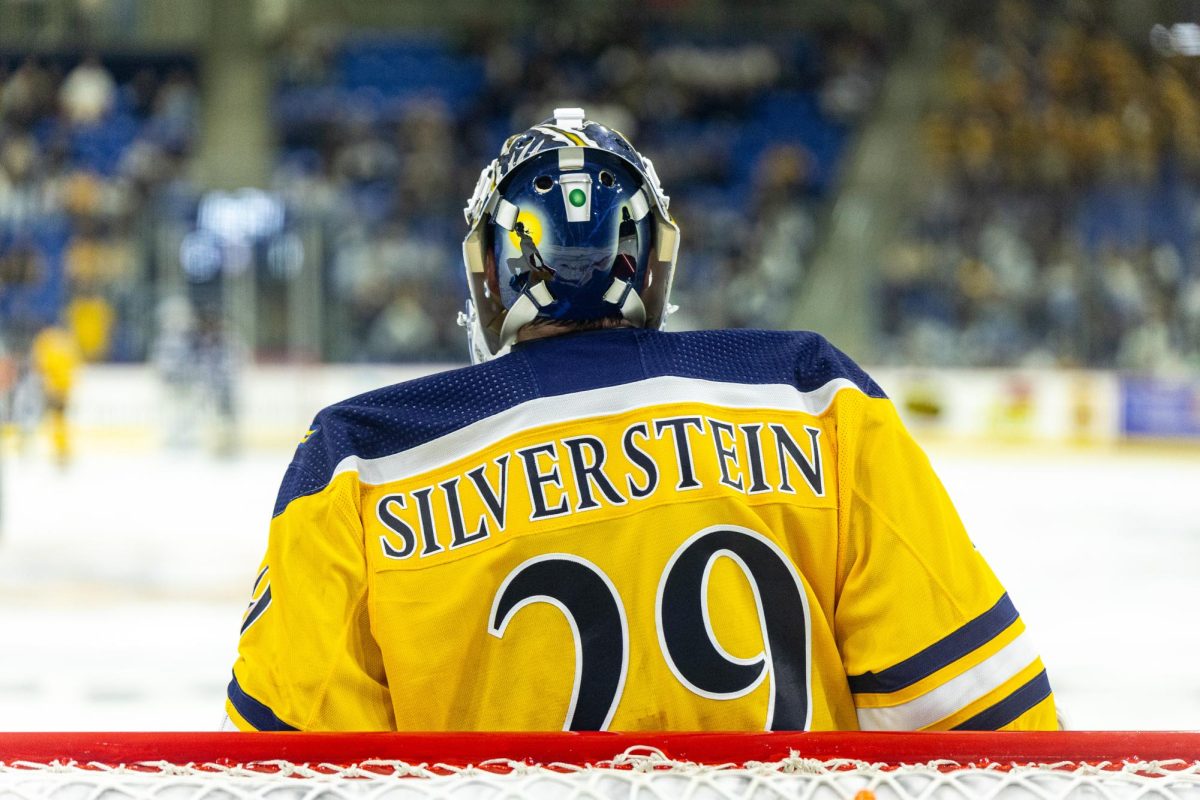 Freshman goaltender Dylan Silverstein during pregame against UNH on Oct. 25.