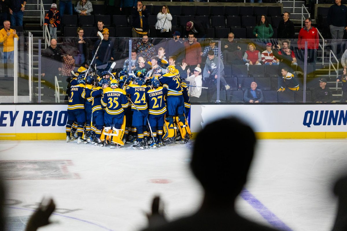 Quinnipiac celebrates an overtime win over Wisconsin in the NCAA Regional semifinal on March 29.