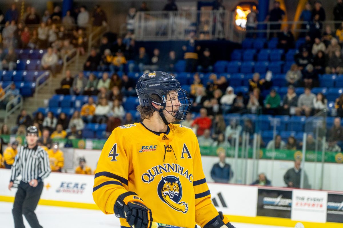 Senior defenseman Davis Pennington wears Bauer gear against UNH on Oct. 26.