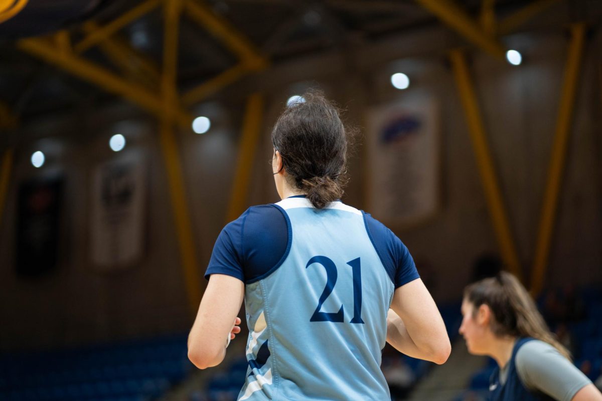 Senior guard Jackie Grisdale warms up in a game against SCSU on Oct. 26.