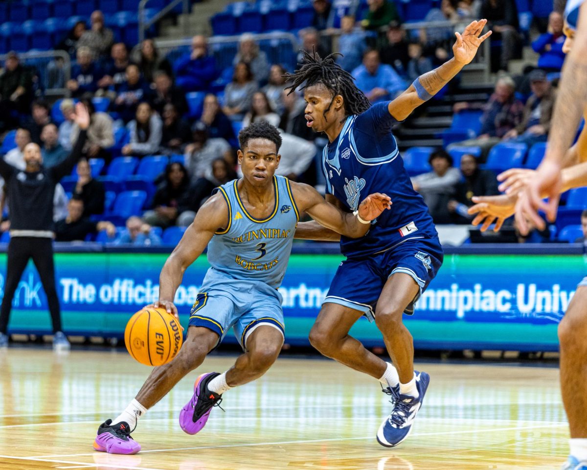 Graduate student guard Savion Lewis drives in the lane against Maine on Nov. 15, 2024 