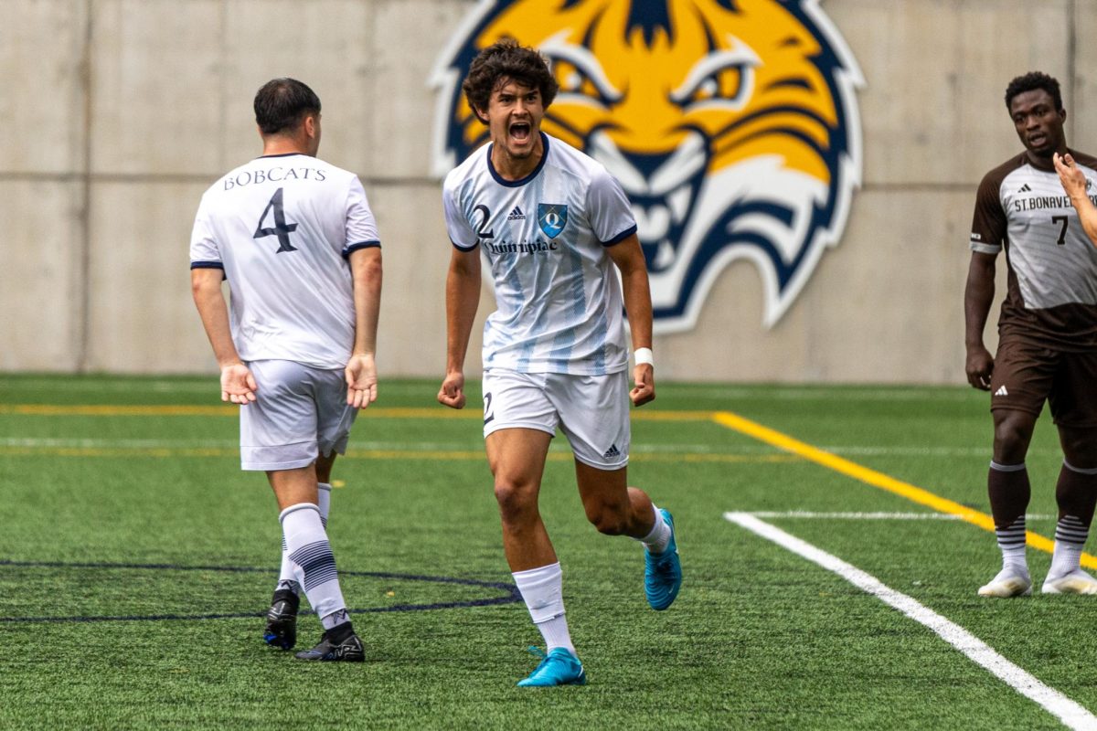 Junior defender João Pinto celebrates after scoring a goal in a 2-1 loss against St. Bonaventure on Sept. 9.