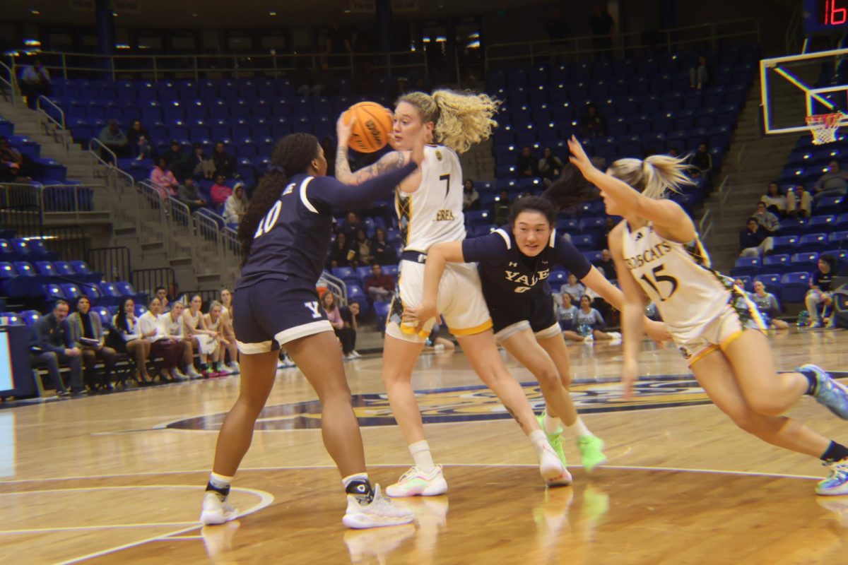 Graduate student forward Caranda Perea prepares to pass the ball against Yale on Dec. 9.