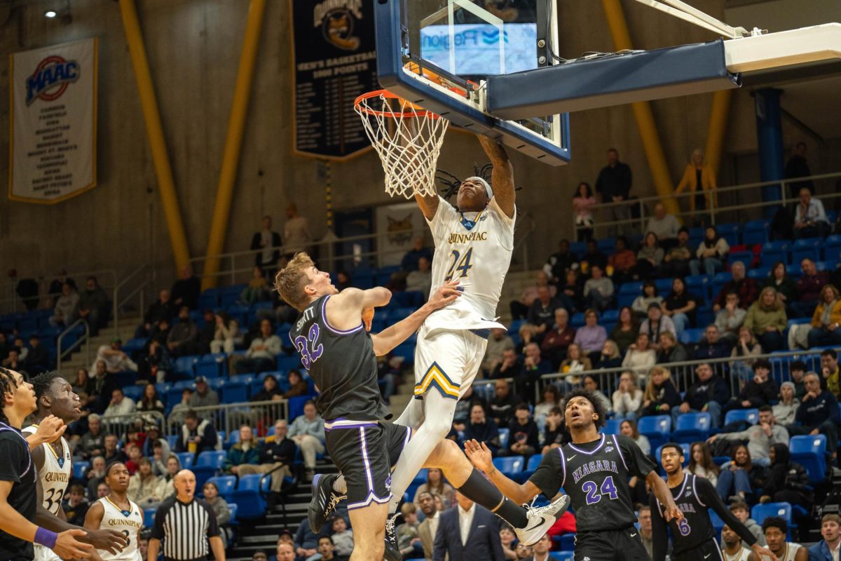 Freshman guard Jaden Zimmerman slams home a dunk during a 76-75 loss to Niagara on Feb. 8, 2025 