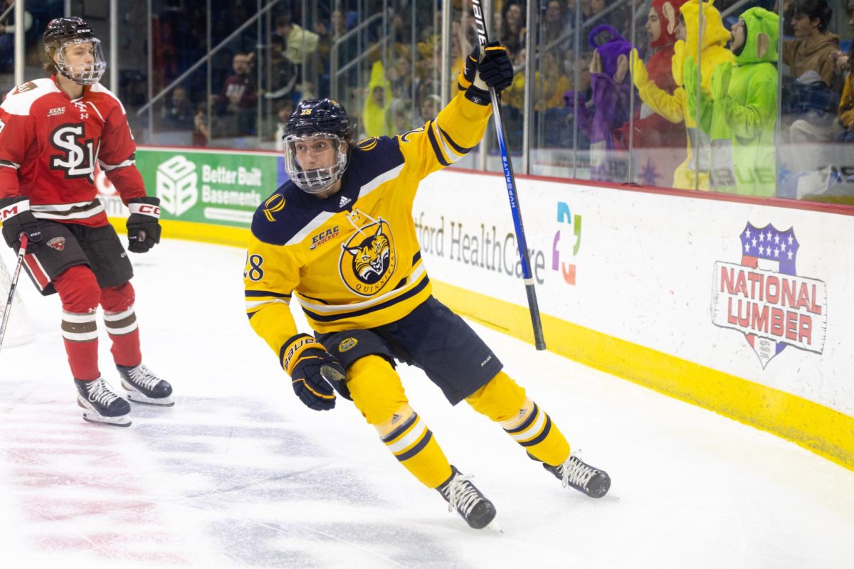 Chris Pelosi celebrates his goal against St. Lawrence on Feb. 7.