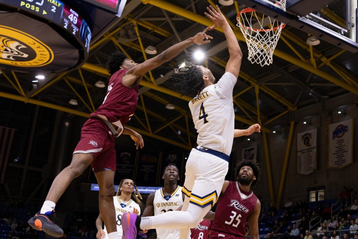 Sophomore guard Khaden Bennett attempts a layup in a 75-64 victory against Rider on Jan. 25.