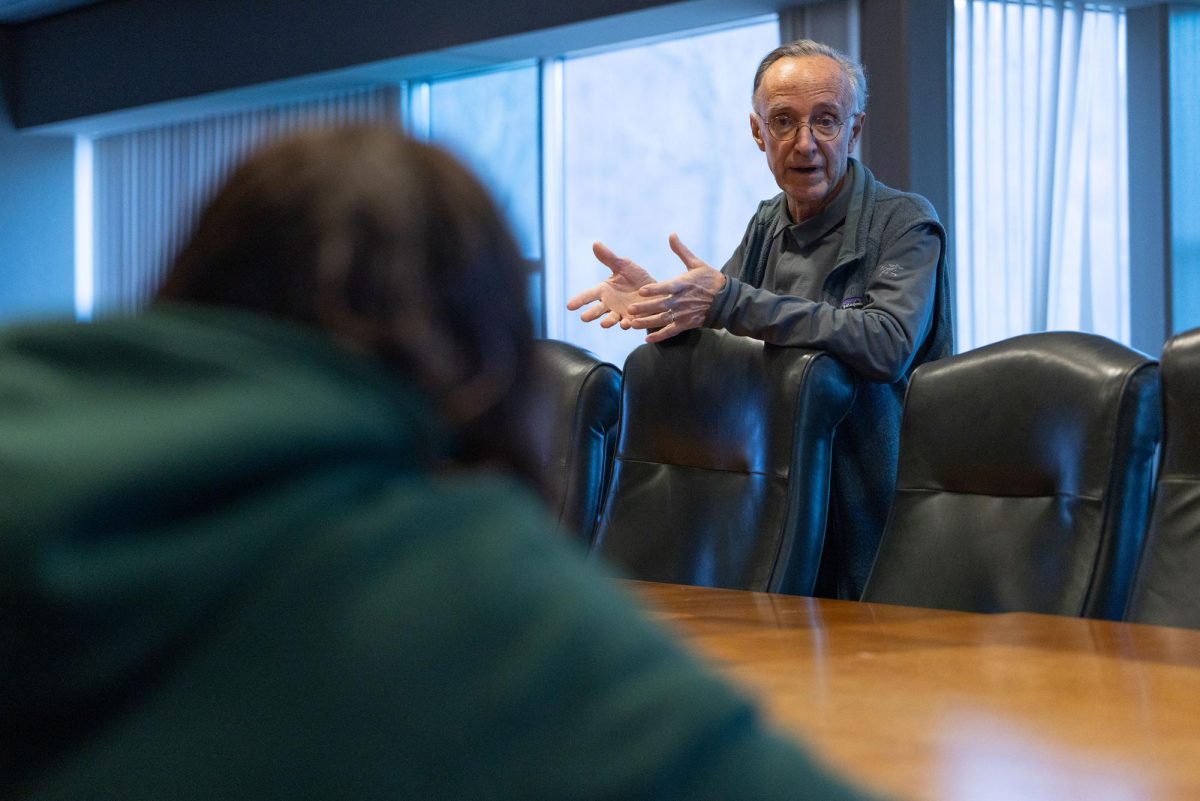 Quinnipiac professor of modern languages Luis Arata explains the Hispanic and Latin American Studies major to students inside the Echlin Center on the Mount Carmel Campus on Feb. 28.