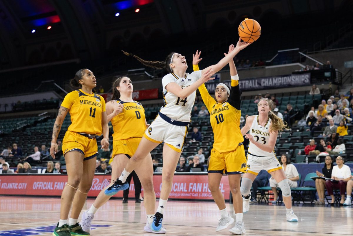 Freshman guard Gal Raviv shoots a layup in a 65-51 win over Merrimack in the MAAC Semifinals on March 14.