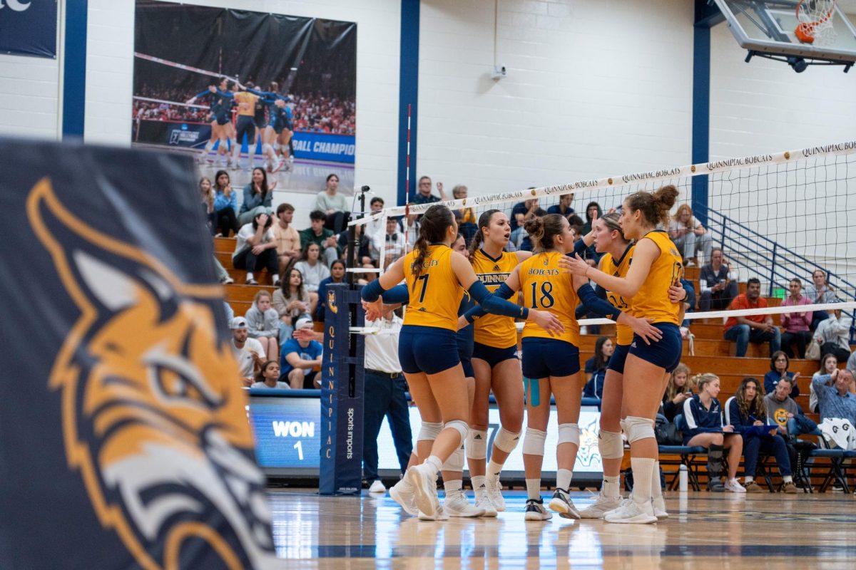 Quinnipiac huddling up against Merrimack on Oct. 3.
